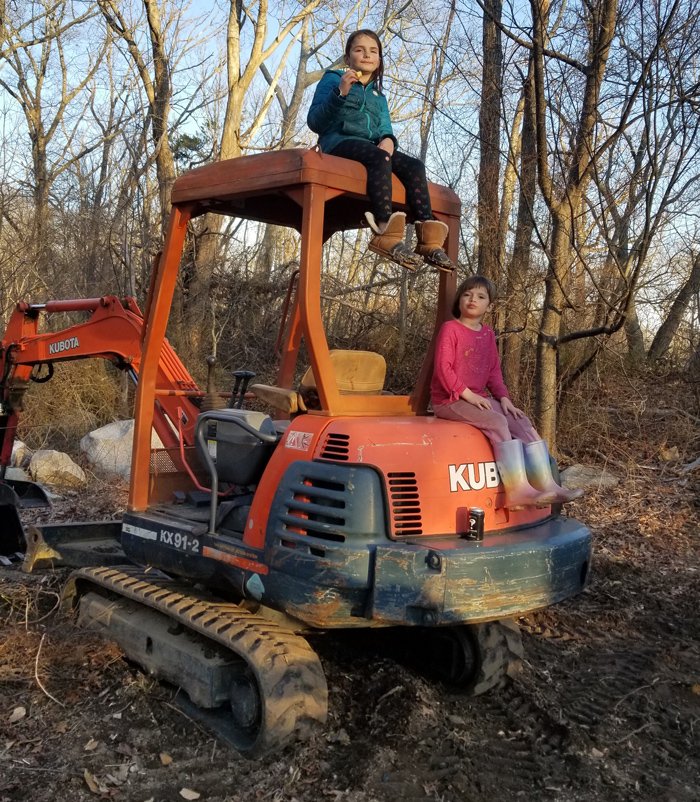 The real bosses, hard at work on the mini excavator
